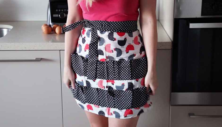 woman wearing apron tied at front