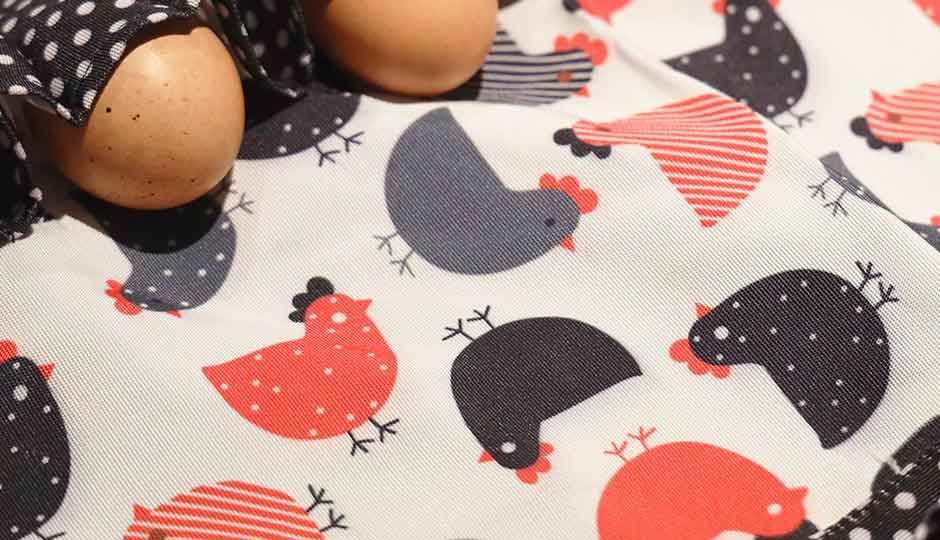 detail shot of apron fabric with colourful print